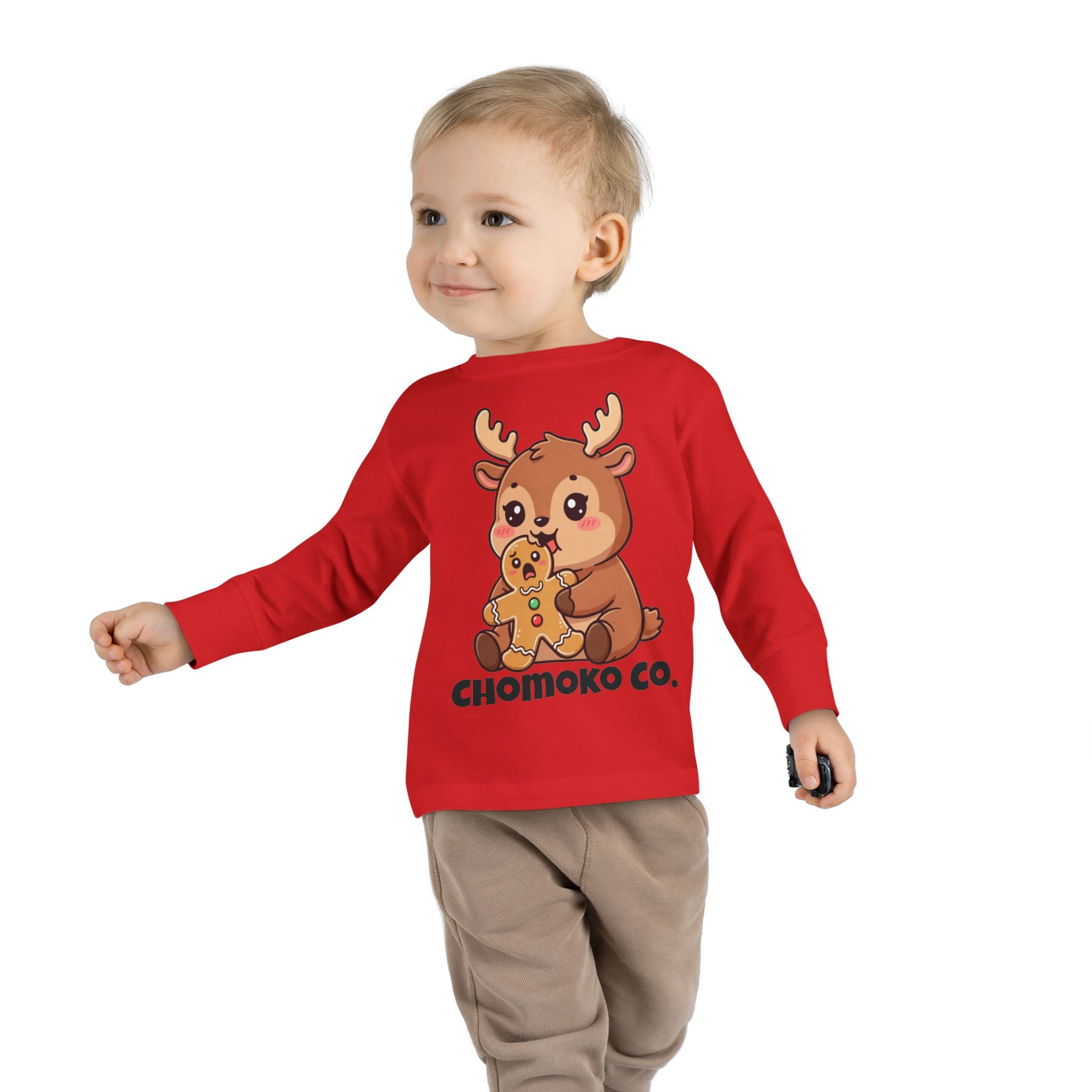 Haru eating a Gingerbread Man Toddler Long Sleeve Tee