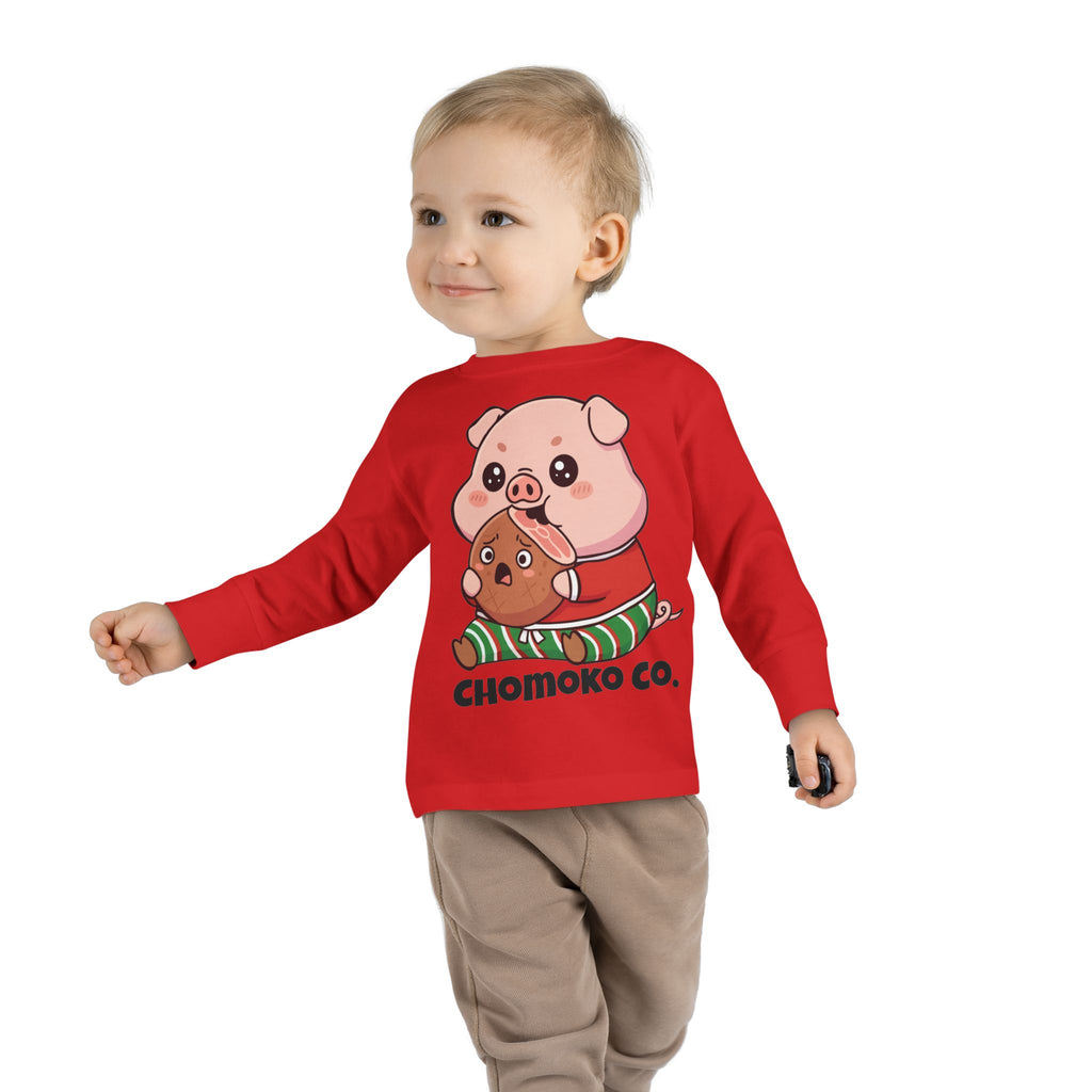 Okui in Christmas pajamas Toddler Long Sleeve Tee