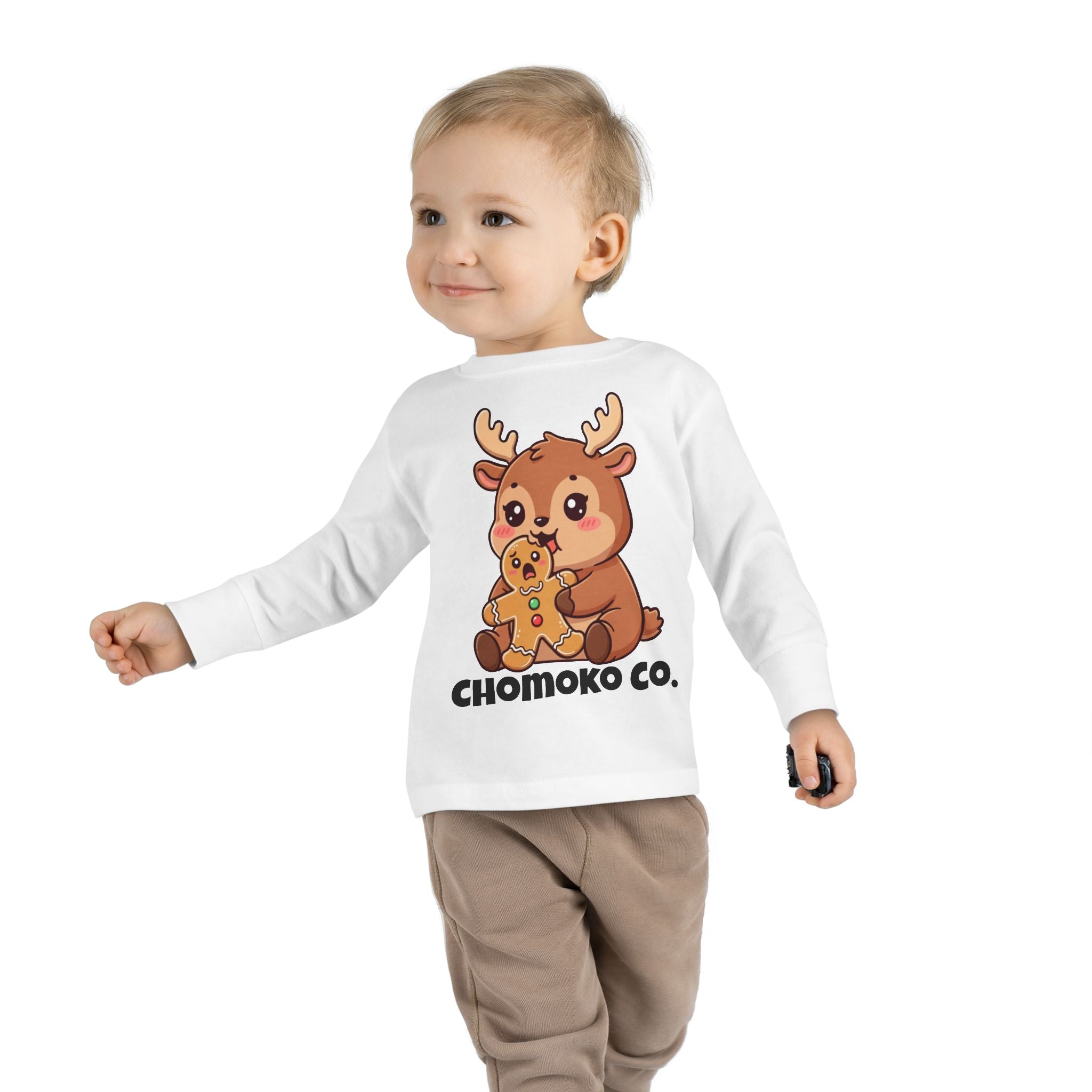 Haru eating a Gingerbread Man Toddler Long Sleeve Tee